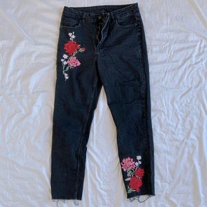 Black cropped embroidered skinny jeans
